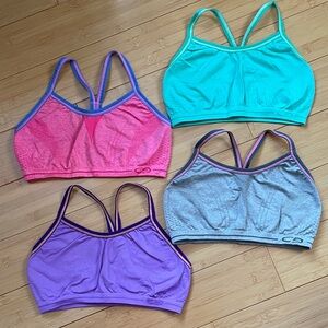 Lot of 4 C9 by Champion racerback sports bras, pink, purple, gray, seafoam LN